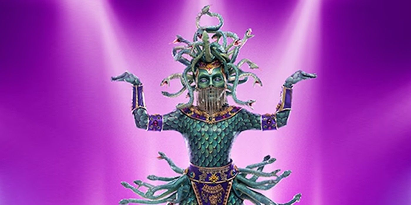 Medusa The Masked Singer posing with purple background