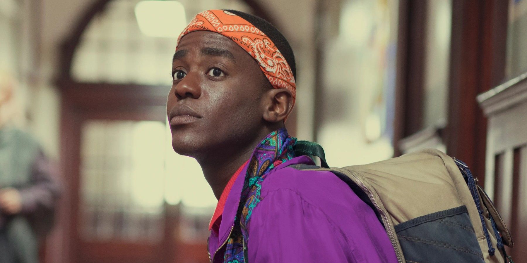 Ncuti Gatwa as Eric wearing a bandana in Sex Education