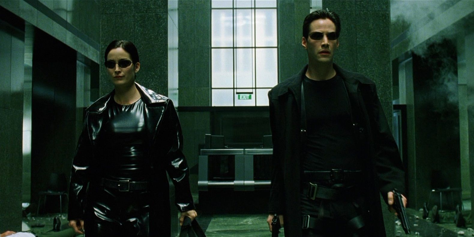 Neo and Trinity in a lobby in The Matrix
