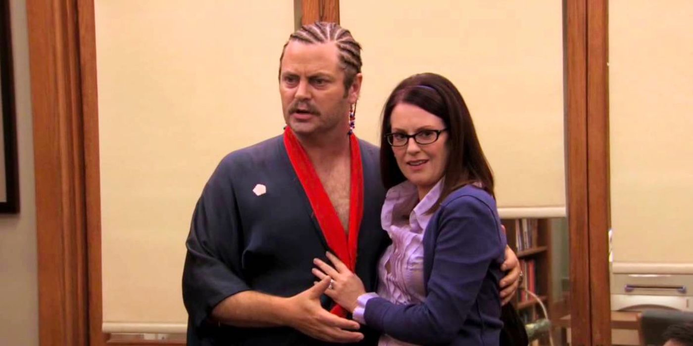 Nick Offerman as Ron Swanson and Megan Mullally as Tammy embracing in Parks and Recreation