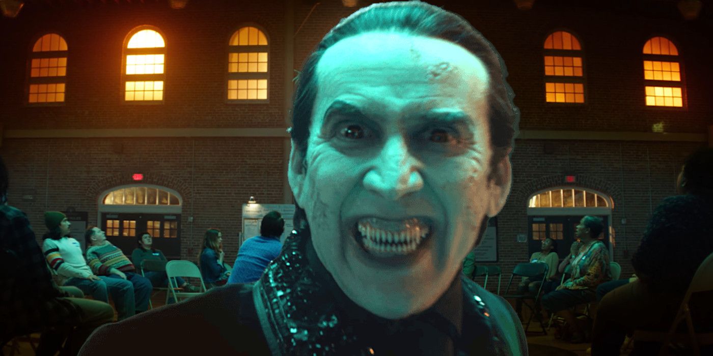 Nicolas Cage as Dracula in Renfield pale white with slicked back hair baring his razor sharp teeth