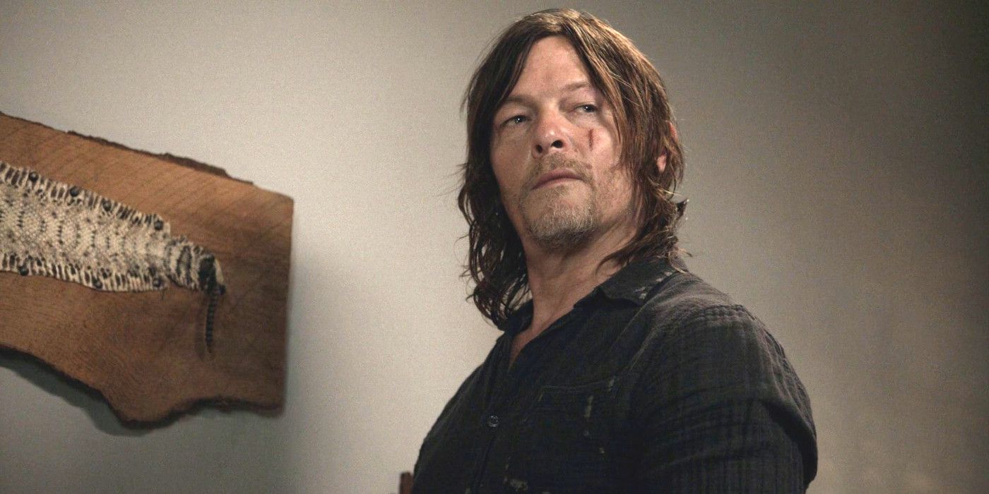 Norman Reedus As Daryl Dixon In The Walking Dead with a scarred face posing and looking skeptical