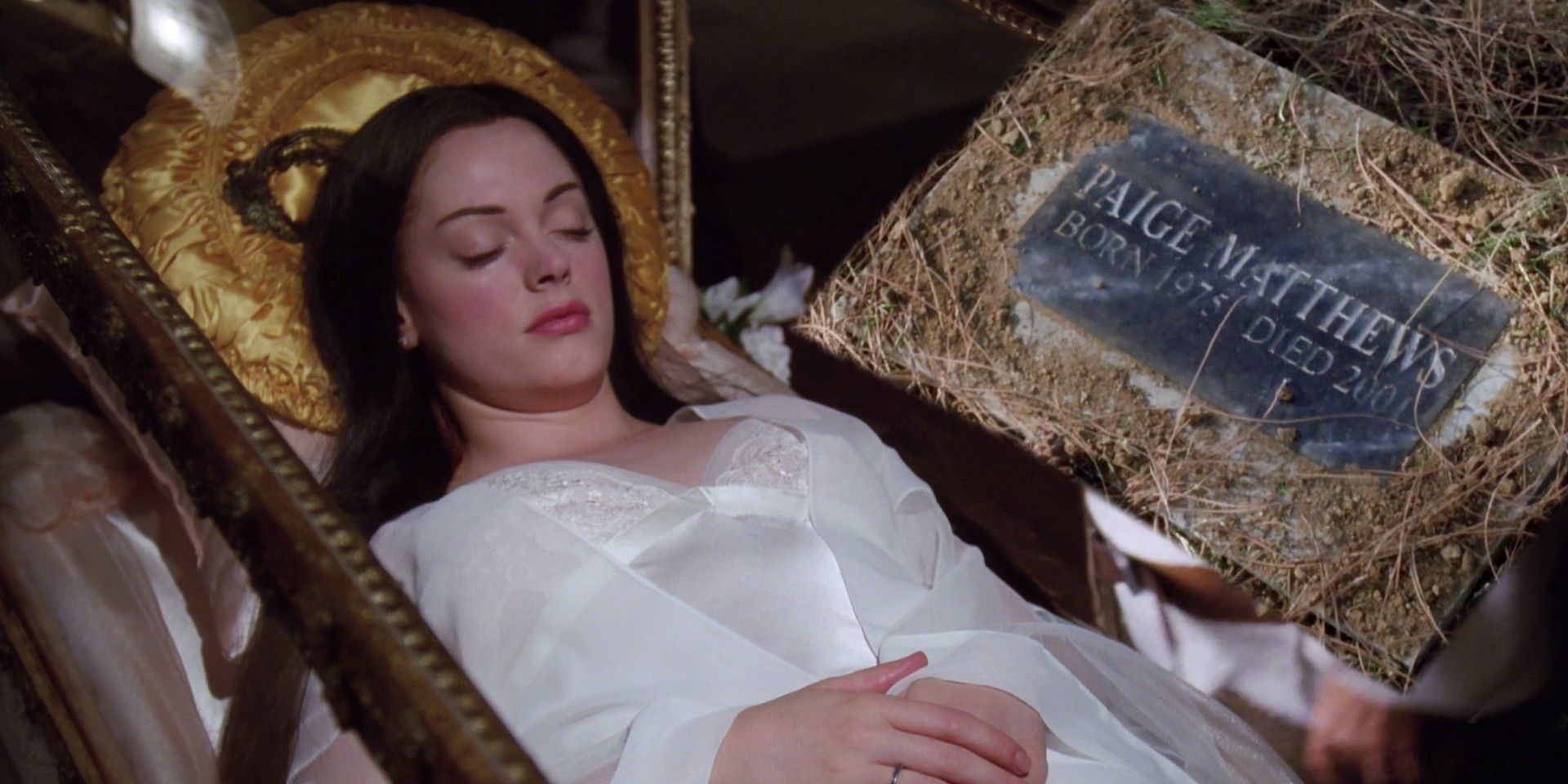 Paige Matthews from Charmed in a glass coffin, with a dated headstone