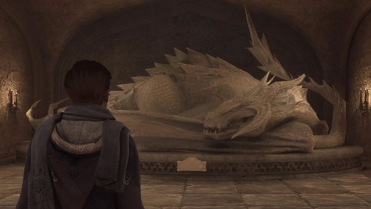 Player looking at the Sleeping Dragon Statue in Hogwarts Legacy