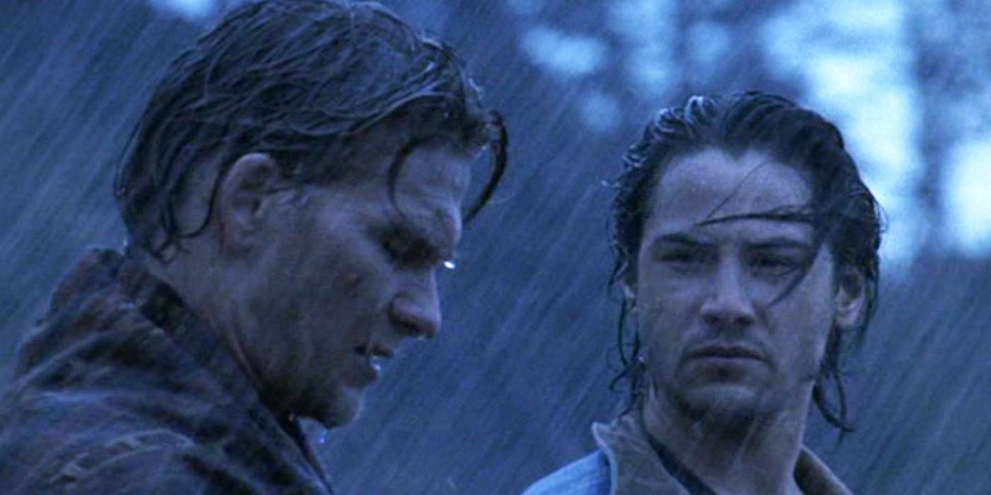Point Break ending pic with Patrick Swayze and Keanu Reeves in the rain