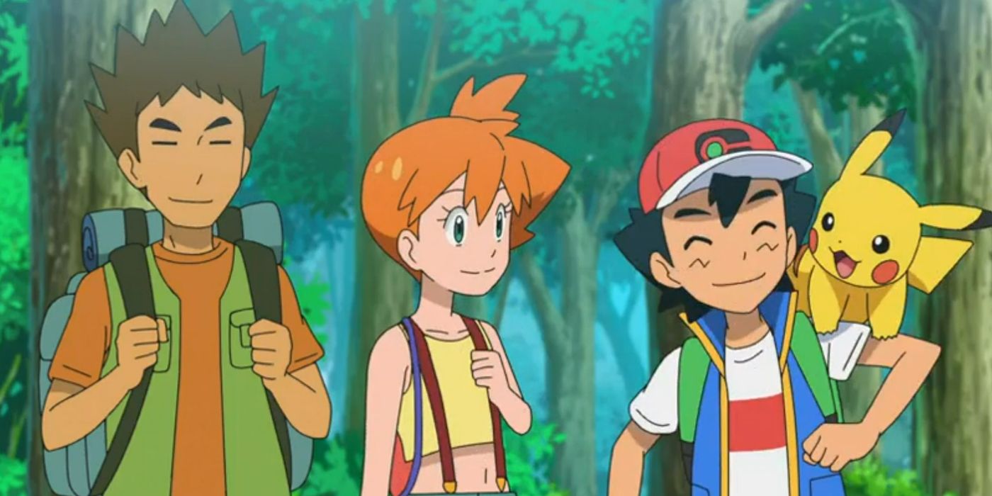 Pokémon: Ash, Misty, dan Brock berdiri di hutan bersama Pikachu saat mereka semua tersenyum.