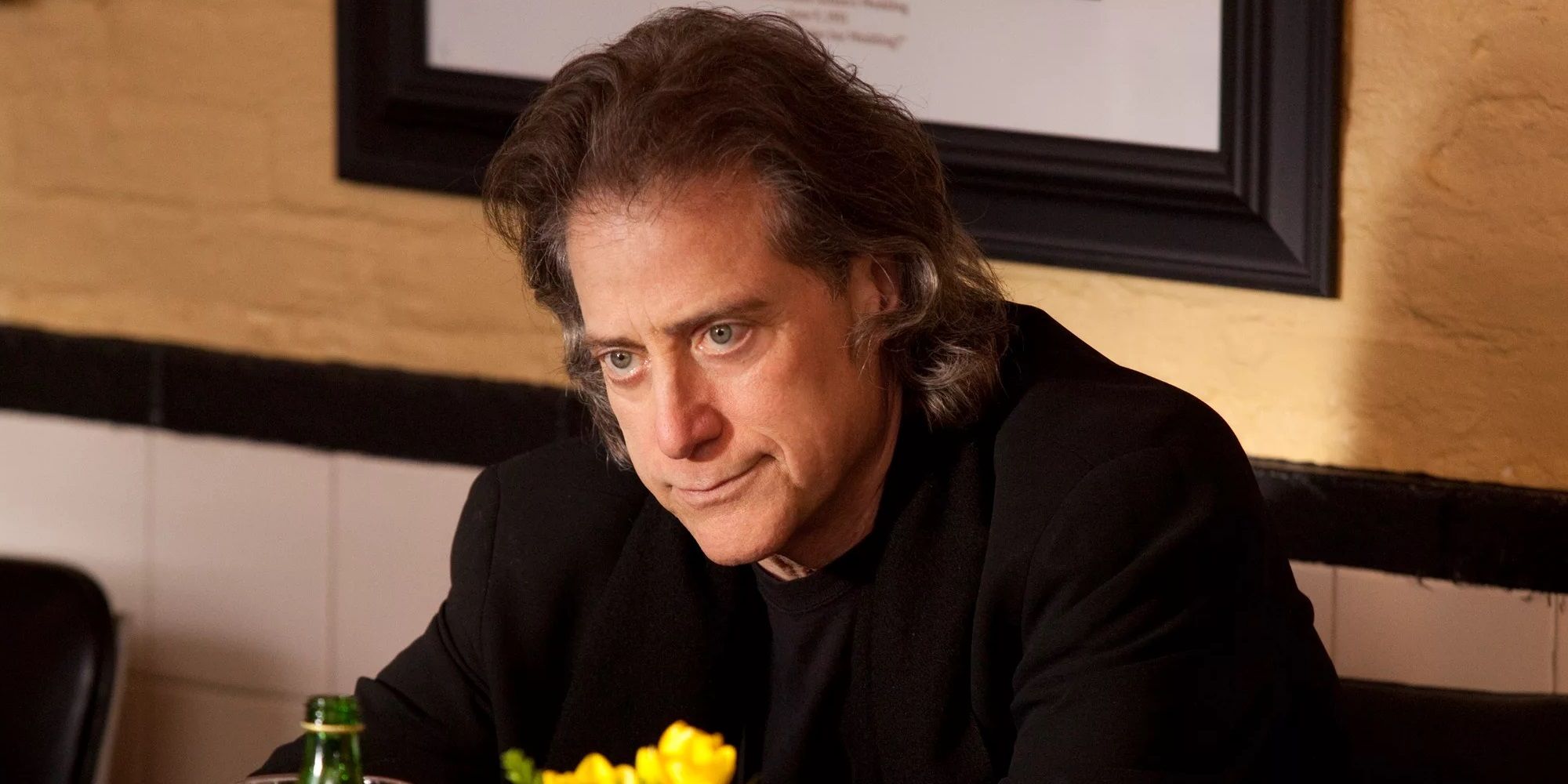 Richard Lewis in a restaurant in Curb Your Enthusiasm