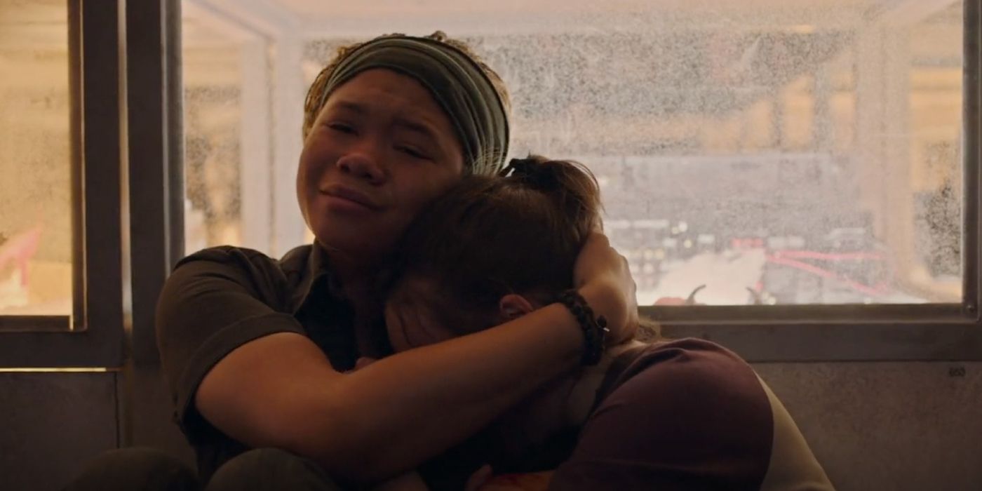Riley crying and hugging Ellie in The Last of Us episode 7