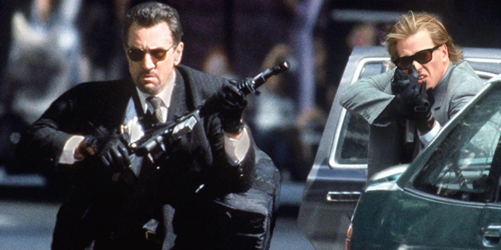 Robert De Niro and Val Kilmer with assault rifles in Heat