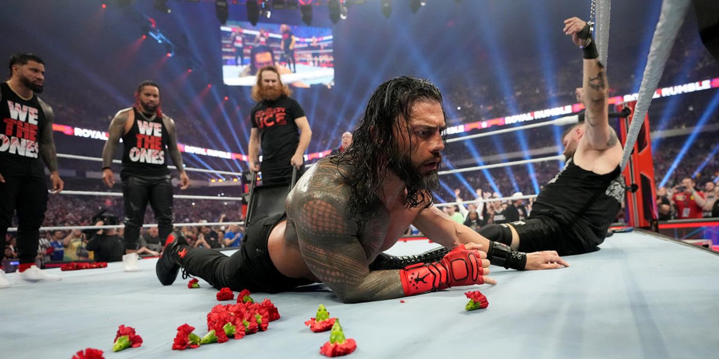 Roman Reigns is in shock after Sami Zayn struck him in the back with a chair during the closing moments of WWE's Royal Rumble PLE in 2023.