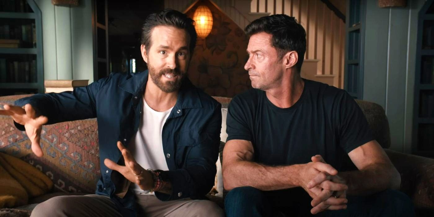 Ryan Reynolds and Hugh Jackman sitting on a couch