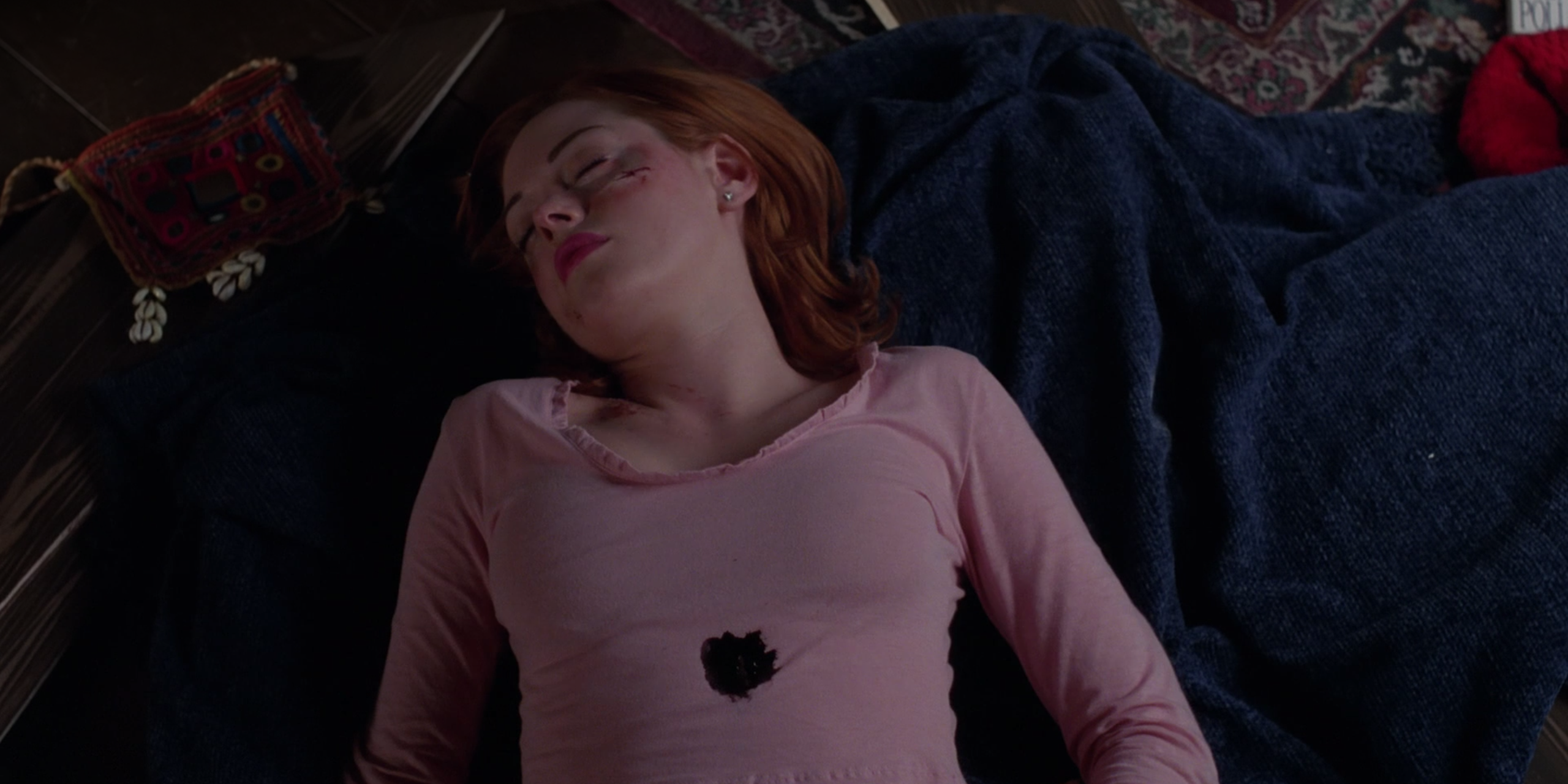 Paige, beaten and stabbed by Phoebe, in Charmed