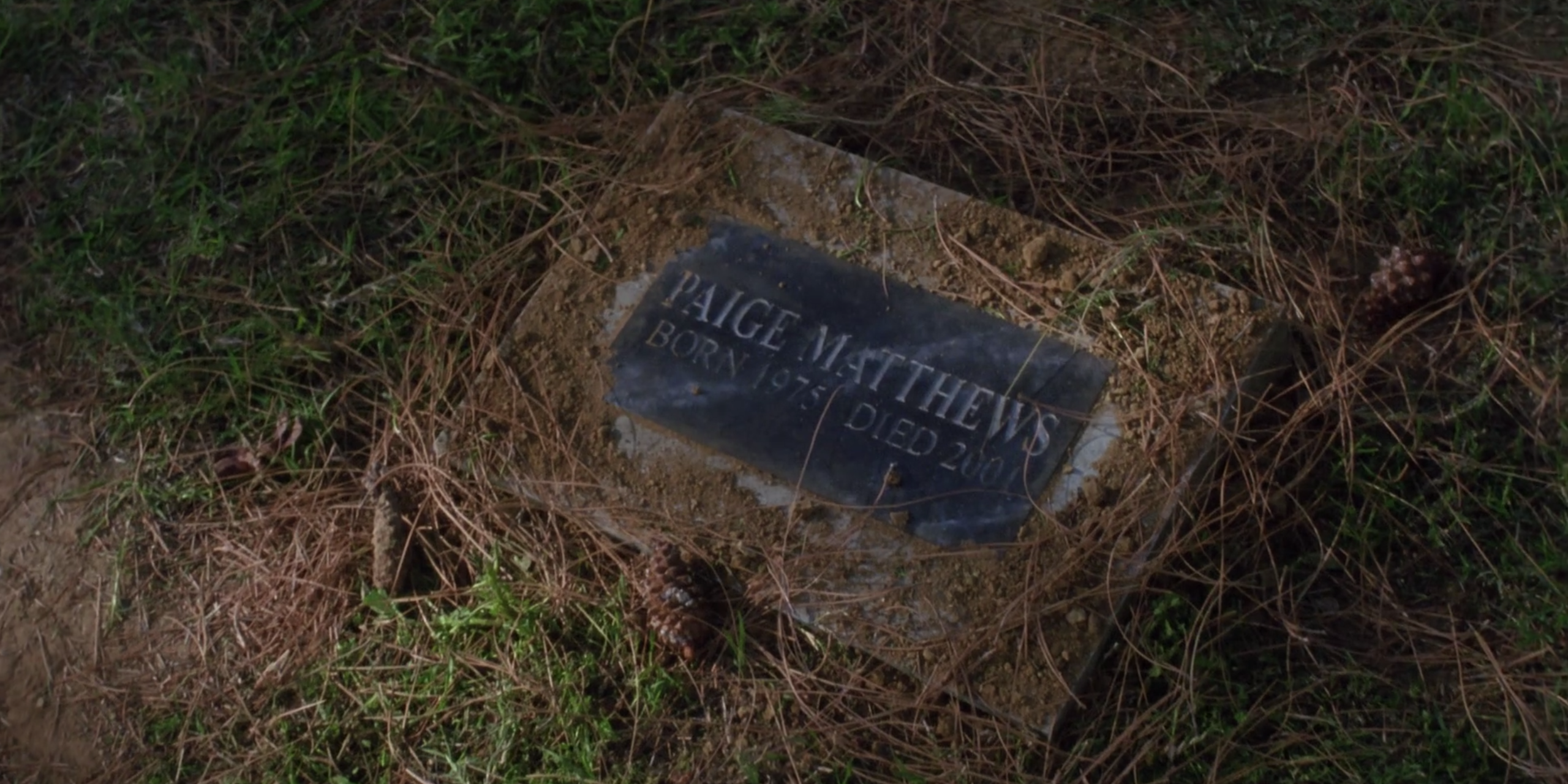 Paige Matthews's tombstone in Charmed (Born 1975, Died 2001)