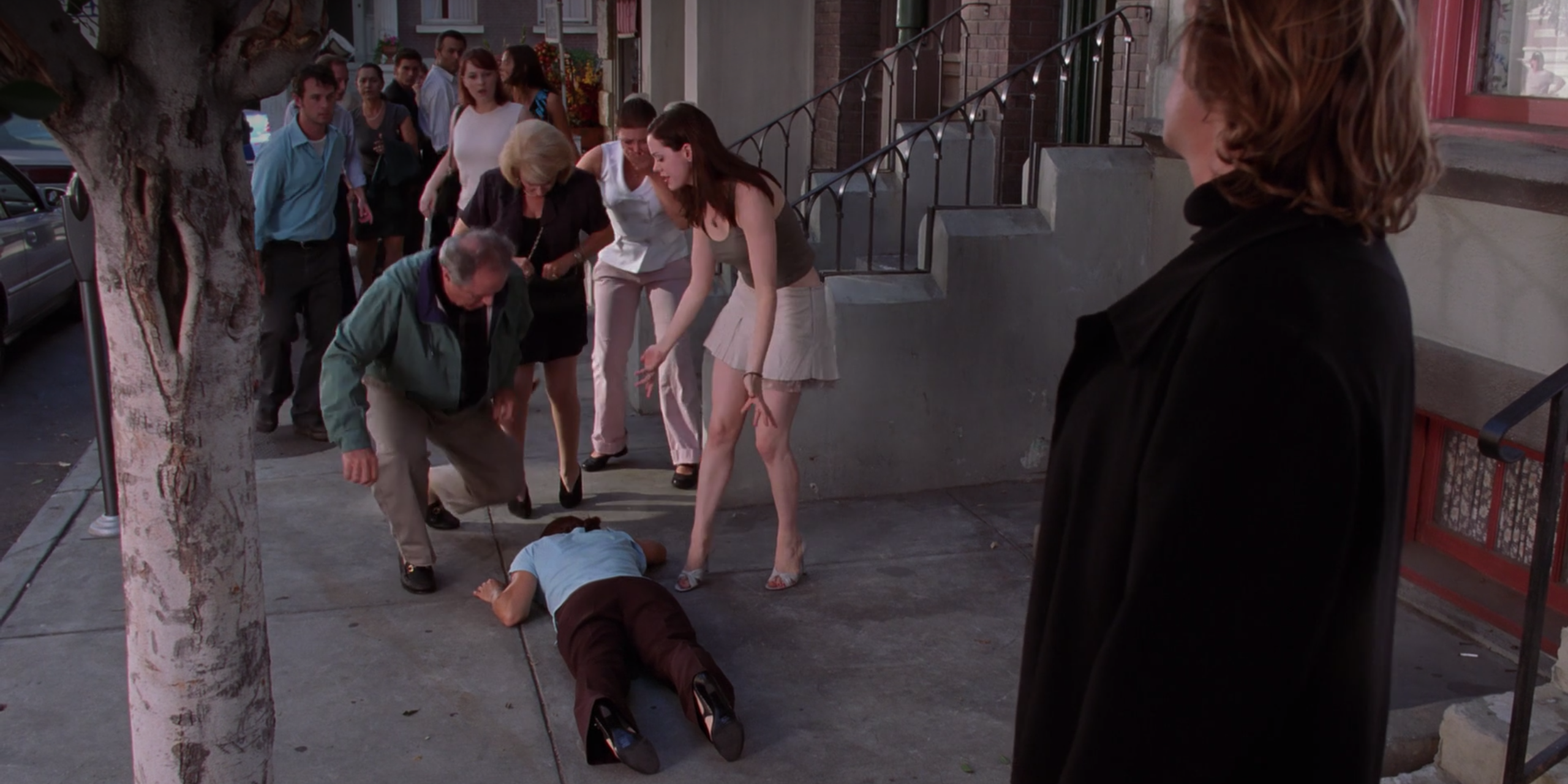 As Paige looks in horror at Piper's corpse in Charmed, the Angel of Death looks on