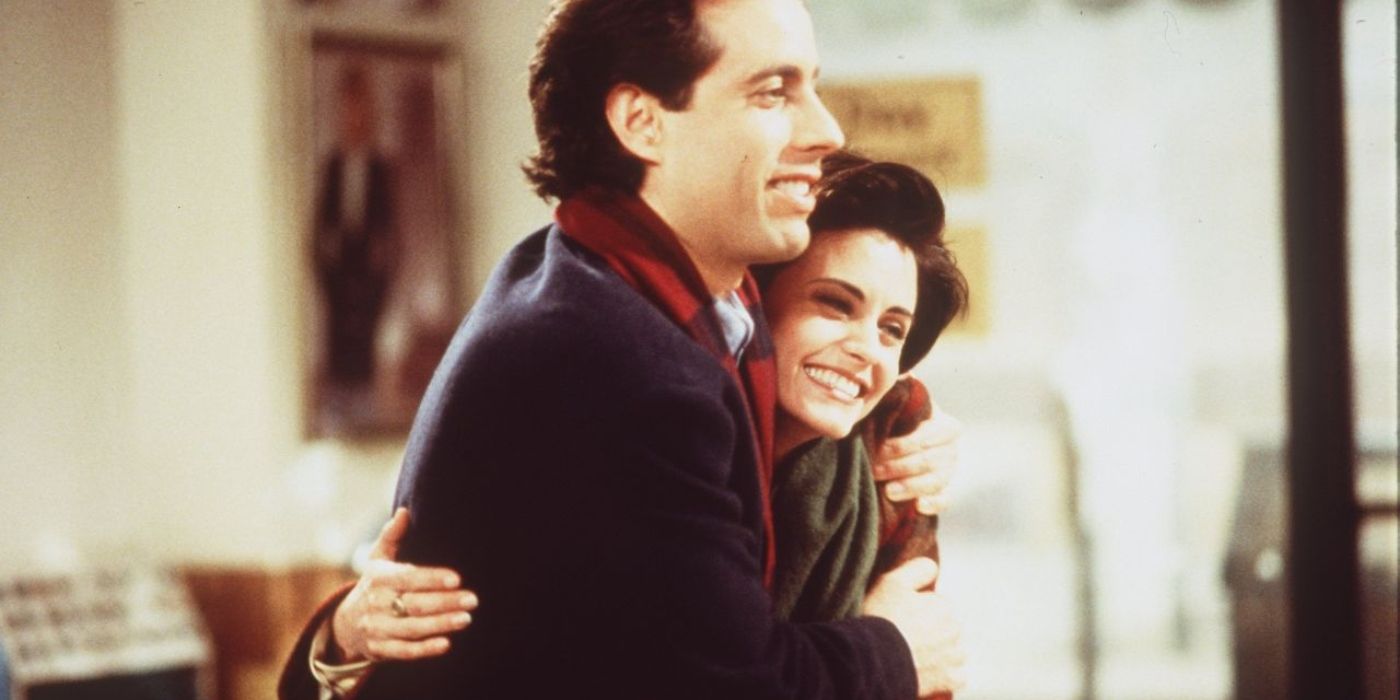 Jerry hugging Meryl and smiling on Seinfeld