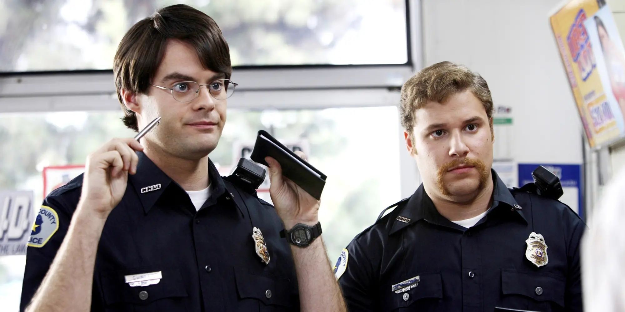 Seth Rogen as Officer Michaels and Bill Hader as Officer Slater in uniform in Superbad