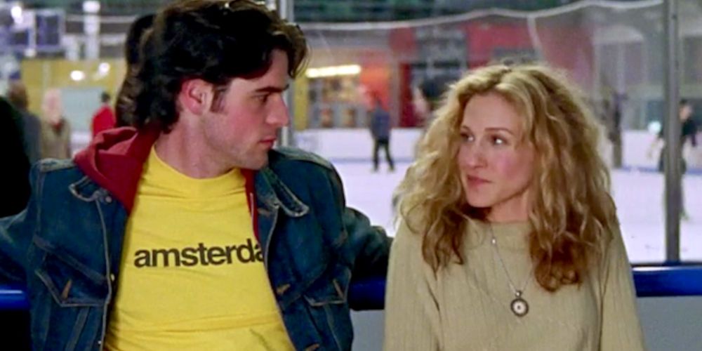Sean and Carrie sitting outside of an ice rink on Sex and the City