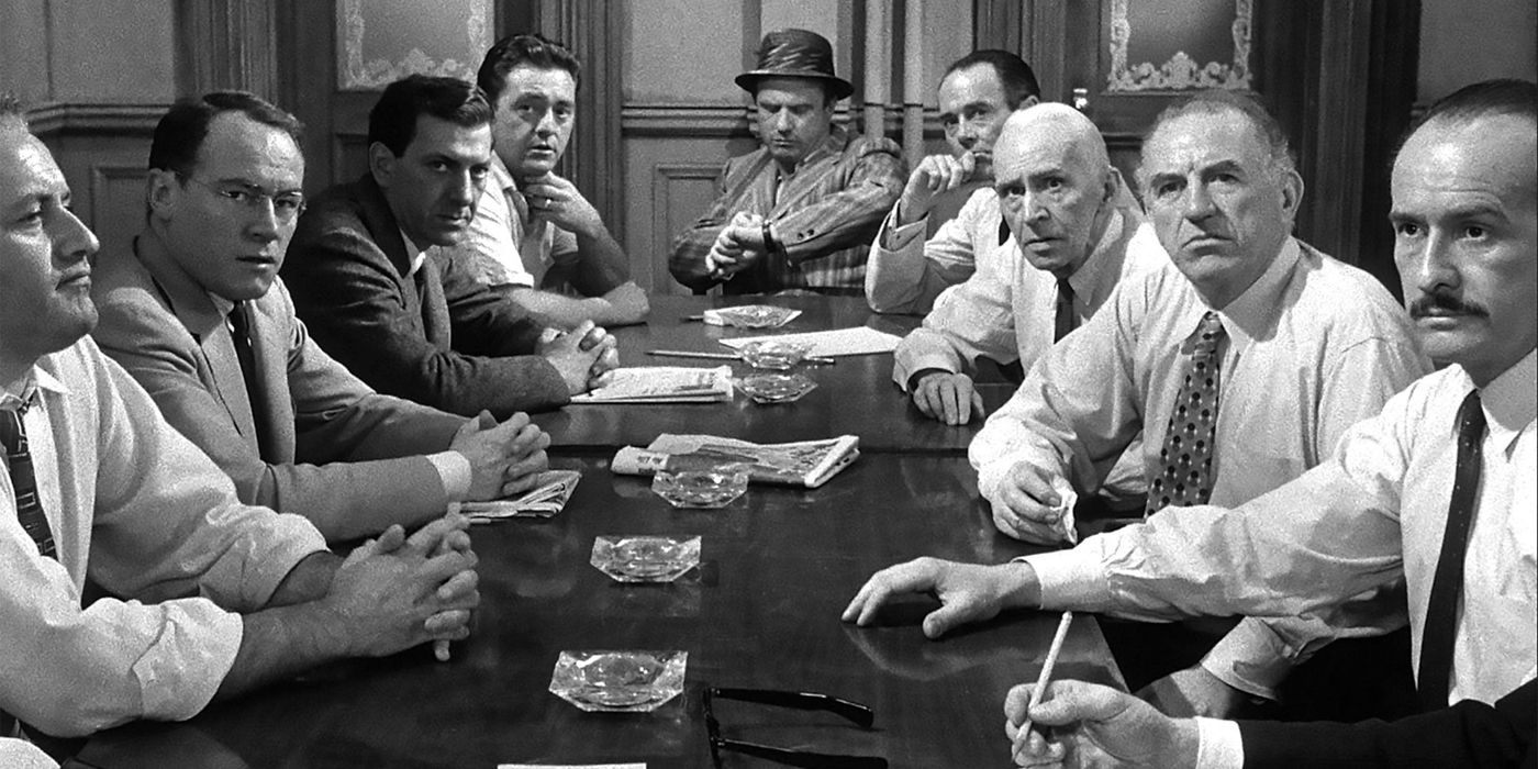 The 12 Angry Men movie jurors at the table.