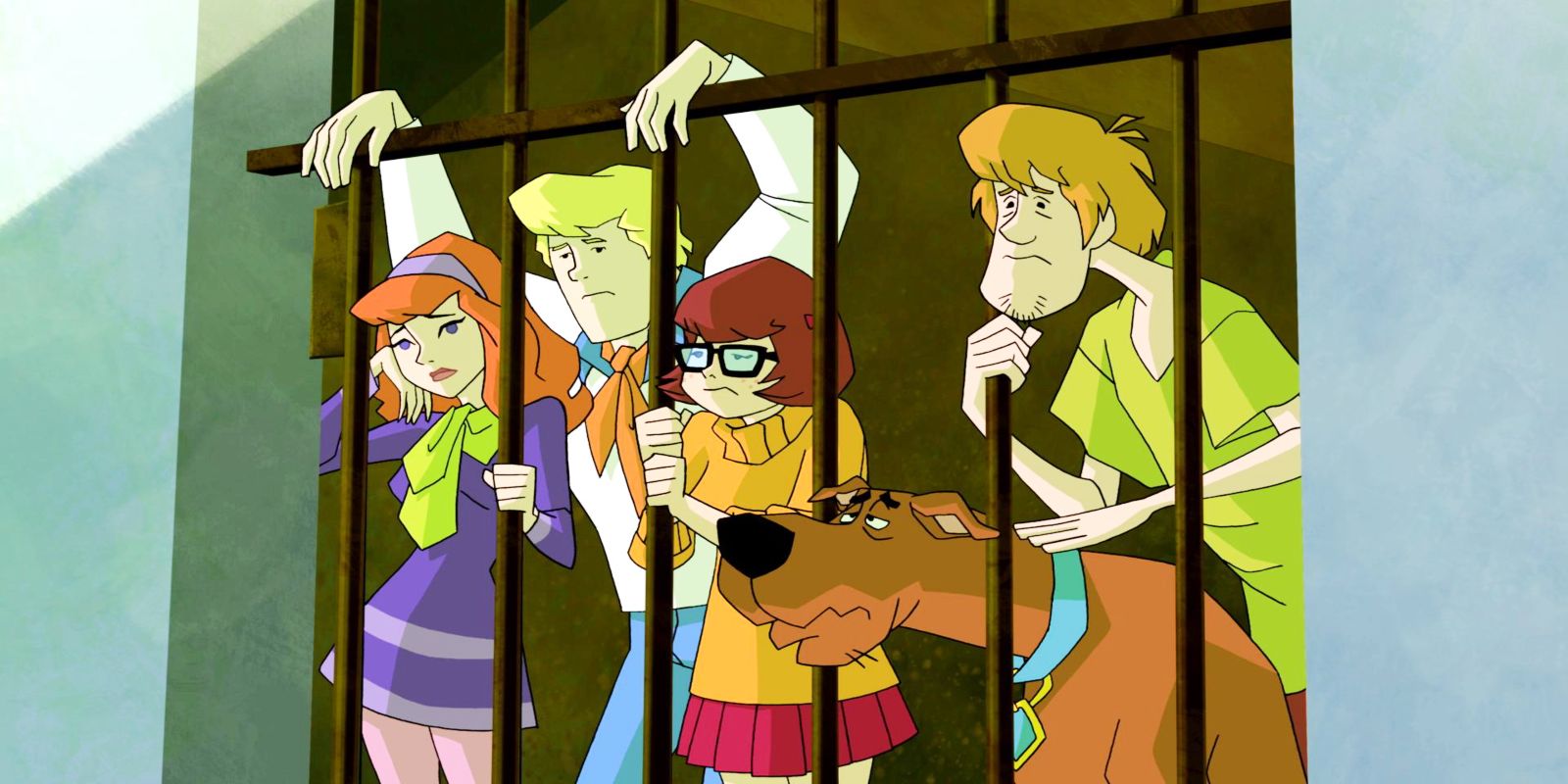 The Scooby-Doo crew behind bars in Scooby-Doo! Mystery Incorporated