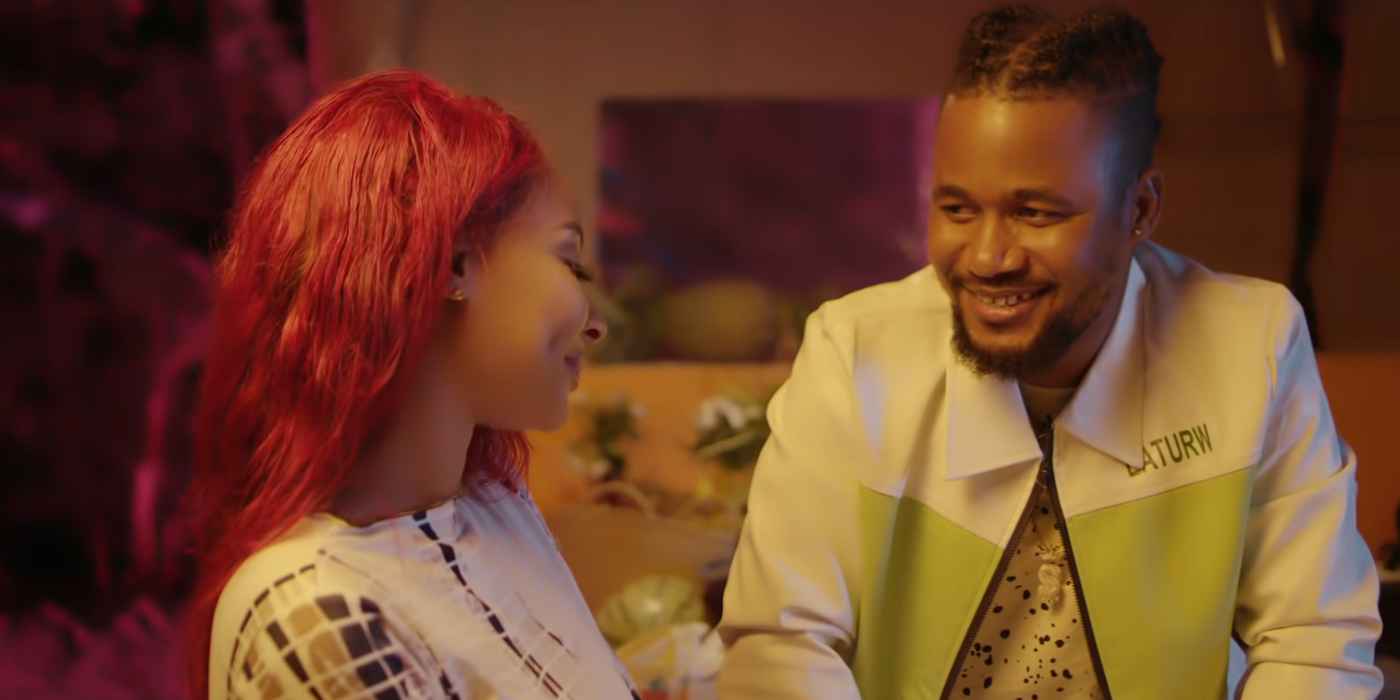 Usman Umar from 90 Day Fiancé smiling with co-star in music video