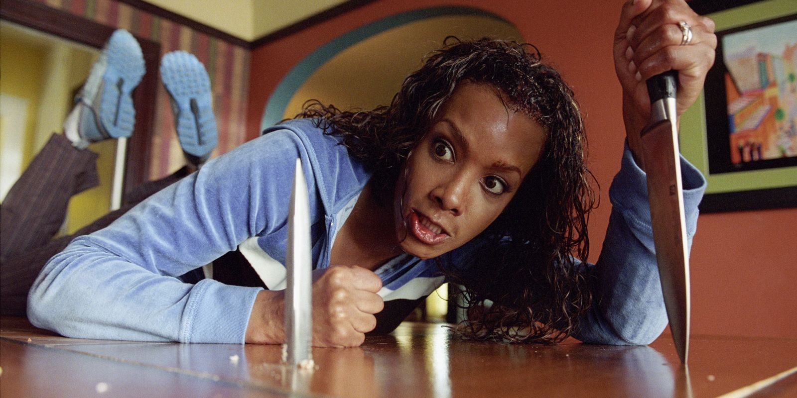 Vivica A. Fox as Vernite Green with a knife in Kill Bill