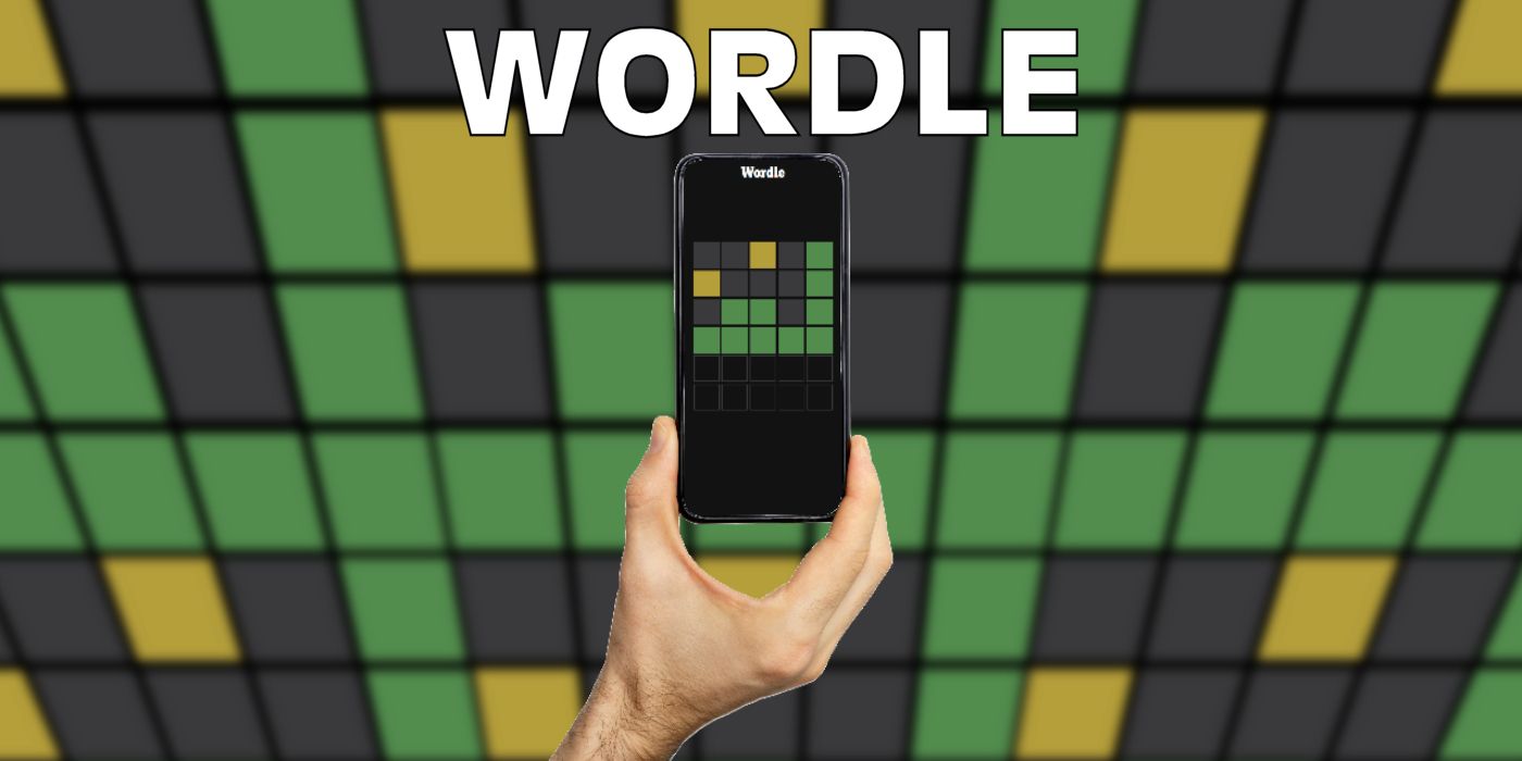 Wordle fundo desfocado com o jogo de segurar a mão no telefone