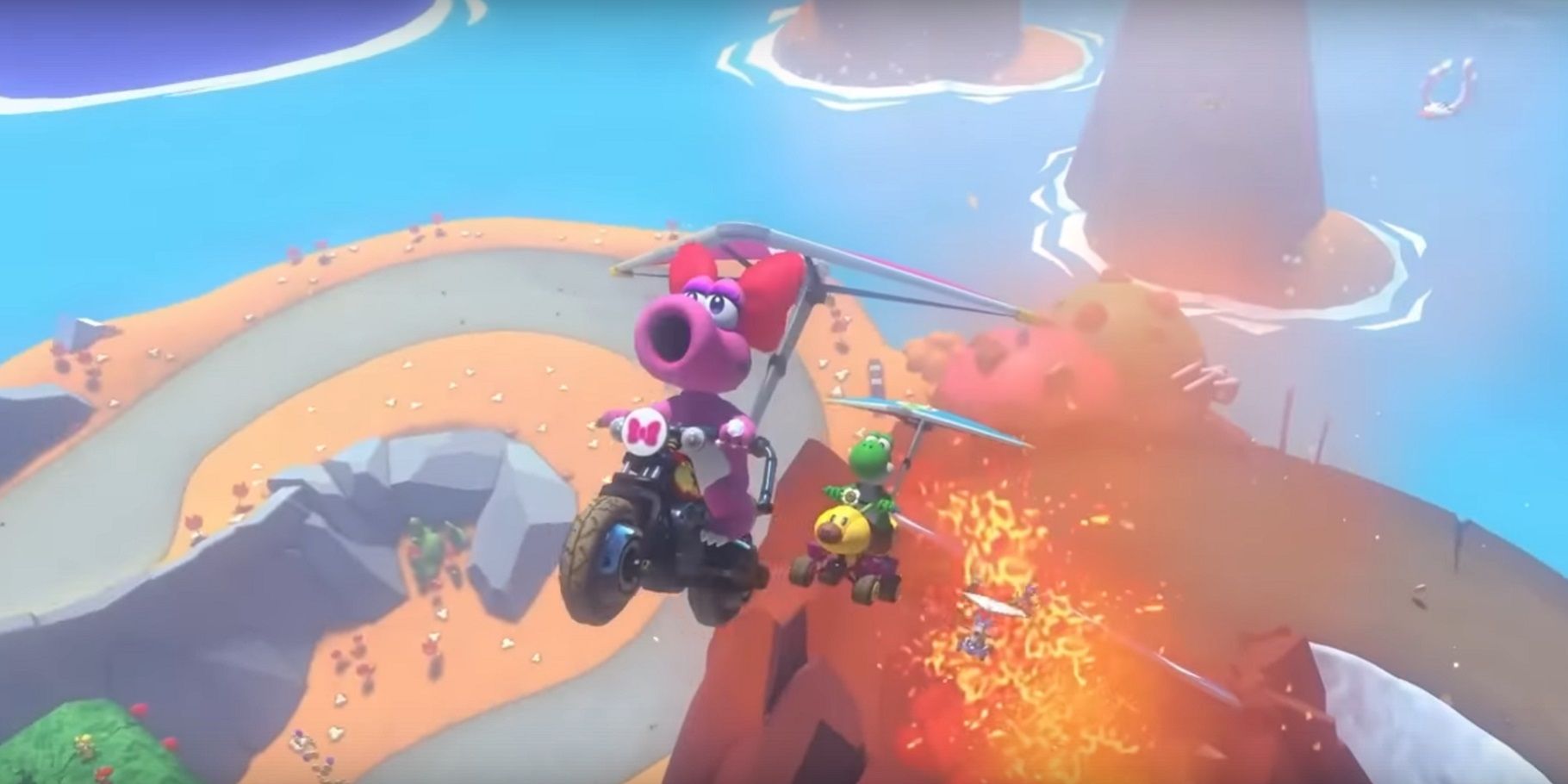 Birdo e Yoshi correndo na Ilha de Yoshi em Mario Kart 8 Deluxe