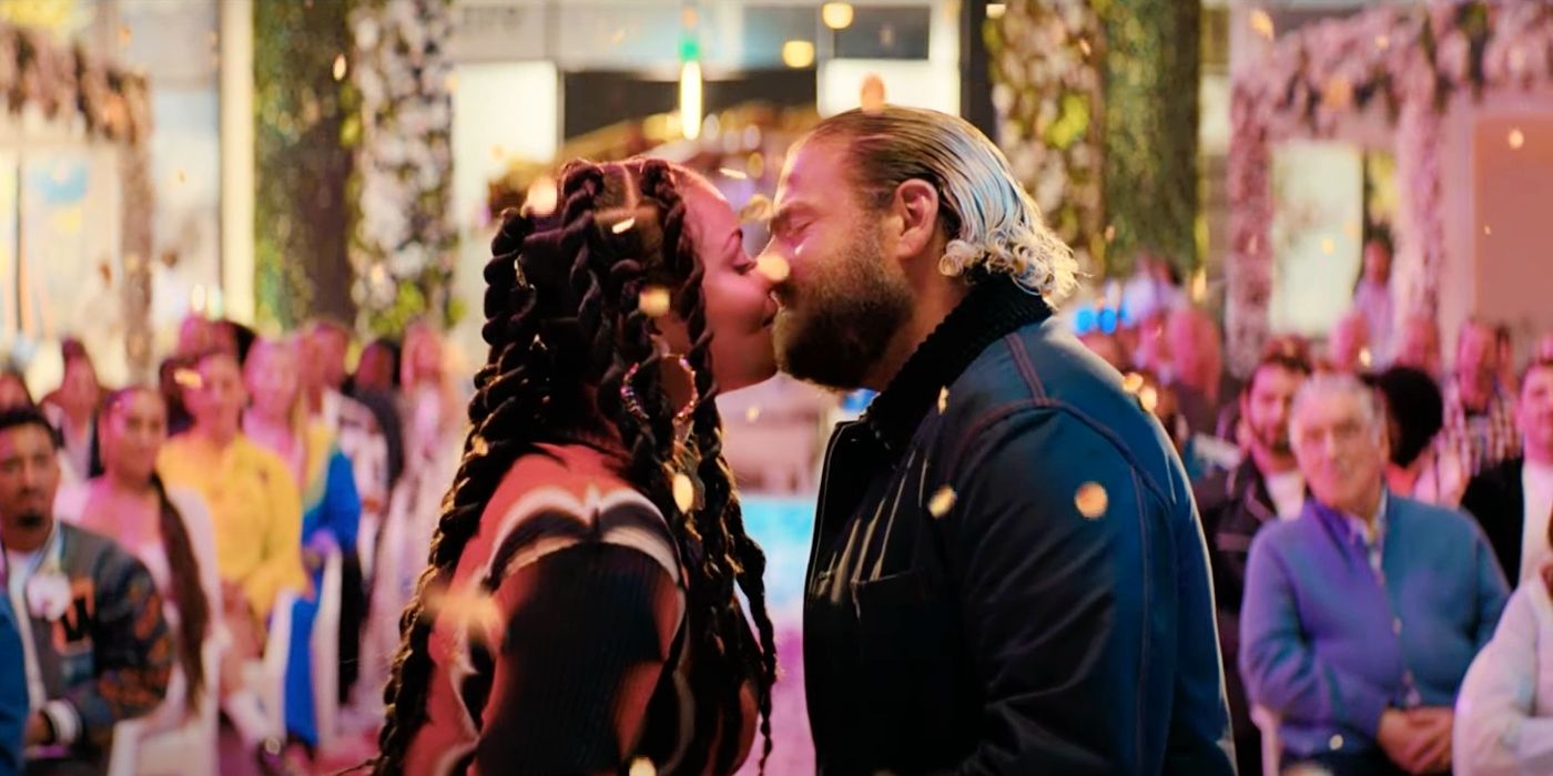 Jonah Hill and Lauren London kiss in You People.
