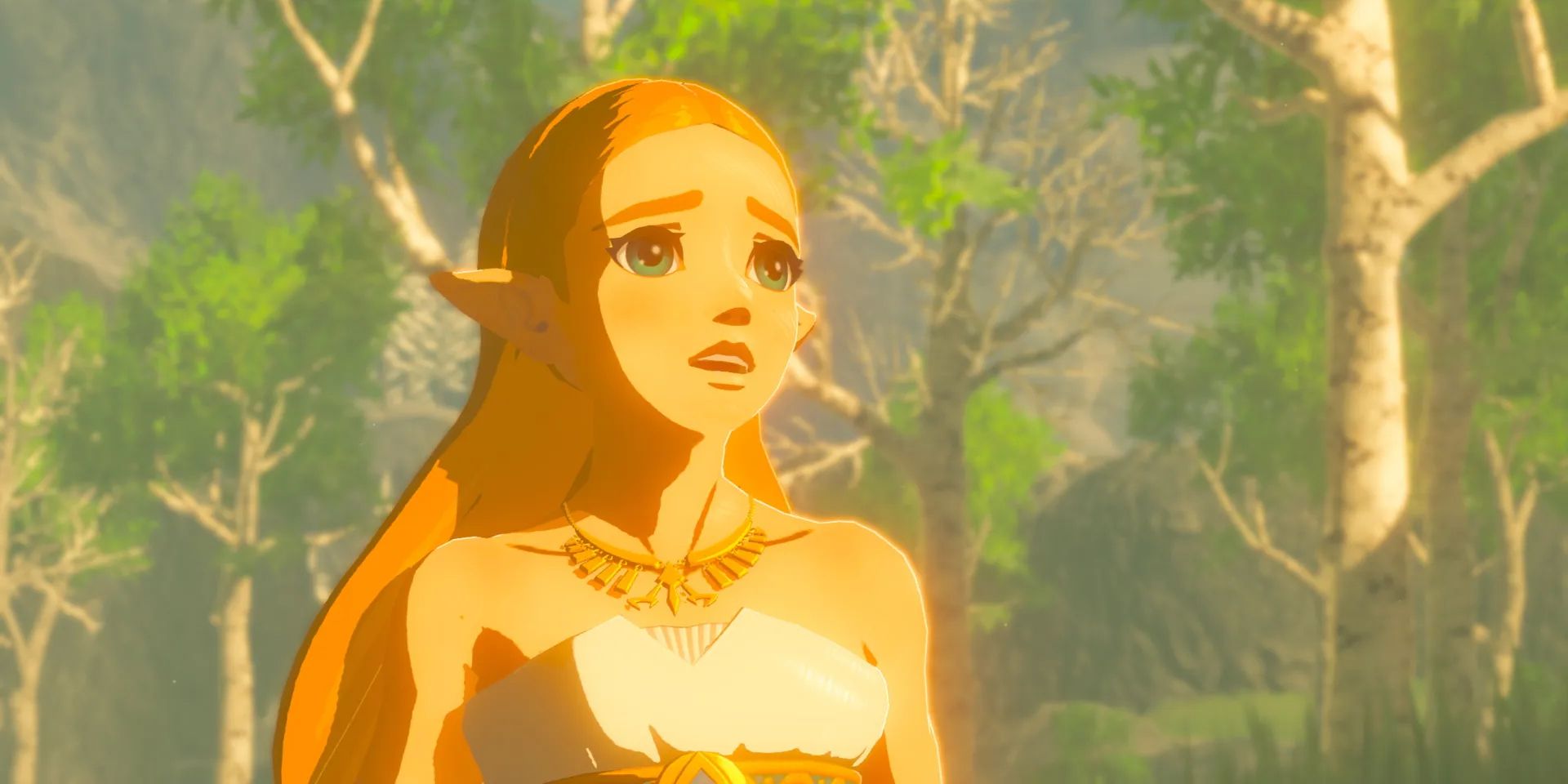 Zelda, waering a white dress and gold necklace, looks concernedly off into the distance while standing in front of a forest in The Legend of Zelda: Breath of the Wild