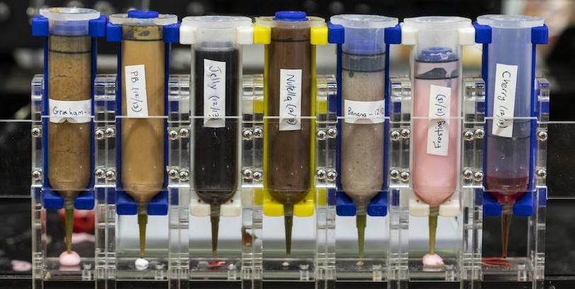 Capsules containing 7 "edible inks" for making 3D printed cheesecake are shown