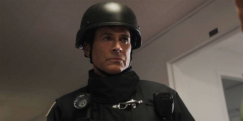 Rob Lowe looks determined while wearing tactical gear in 911 Lone Star season 4