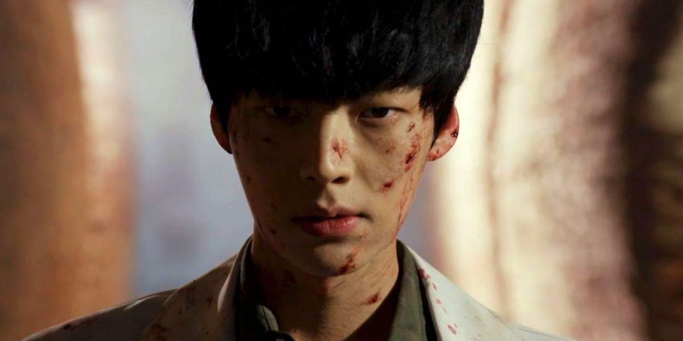 A character with a bloody face in the K-drama Blood