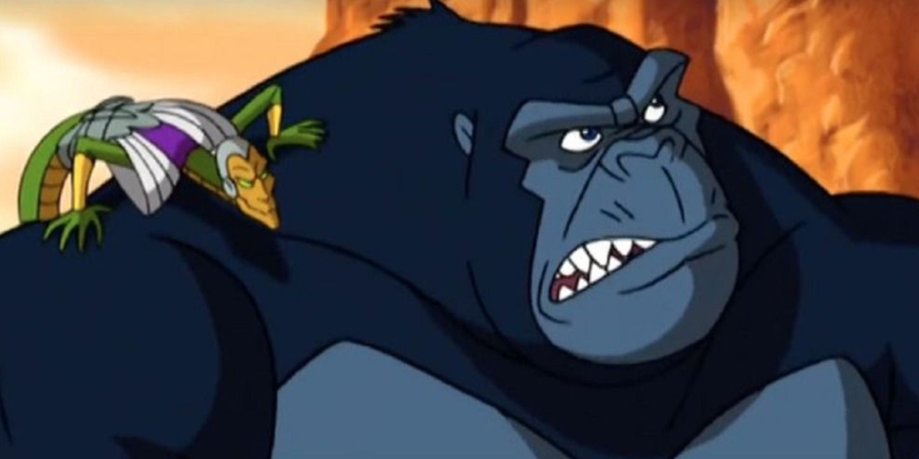 Un primer plano de King Kong con una criatura parecida a un lagarto en su hombro en la película animada Kong: King of Atlantis