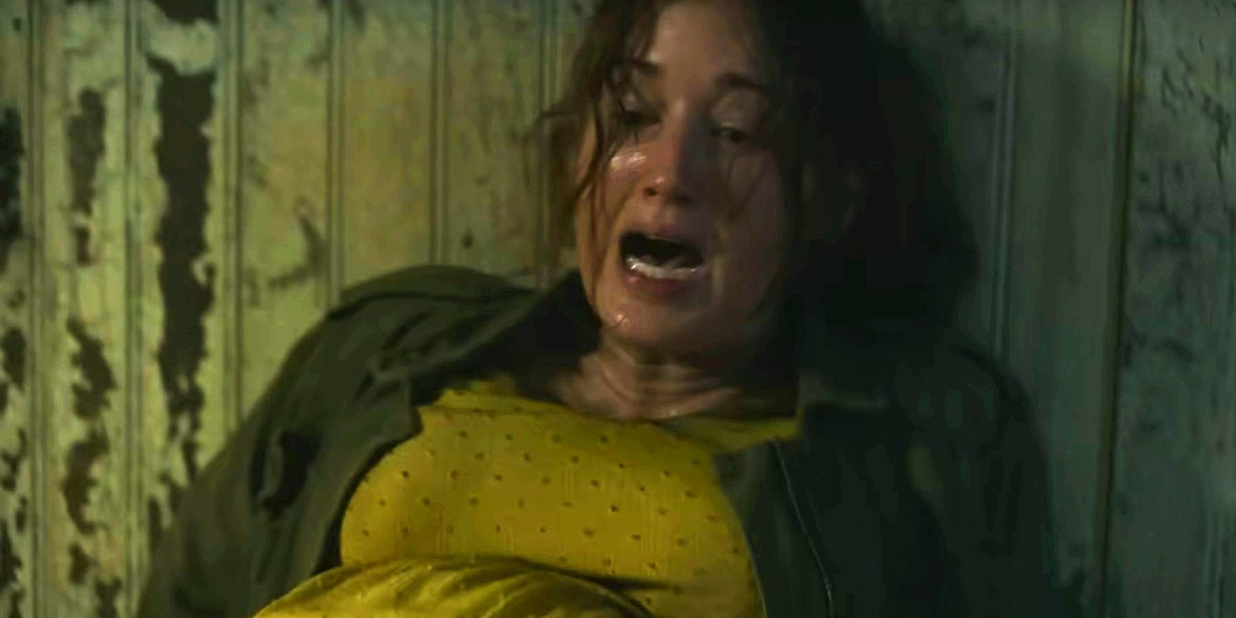 Anna screaming in a room in The Last of Us while giving birth