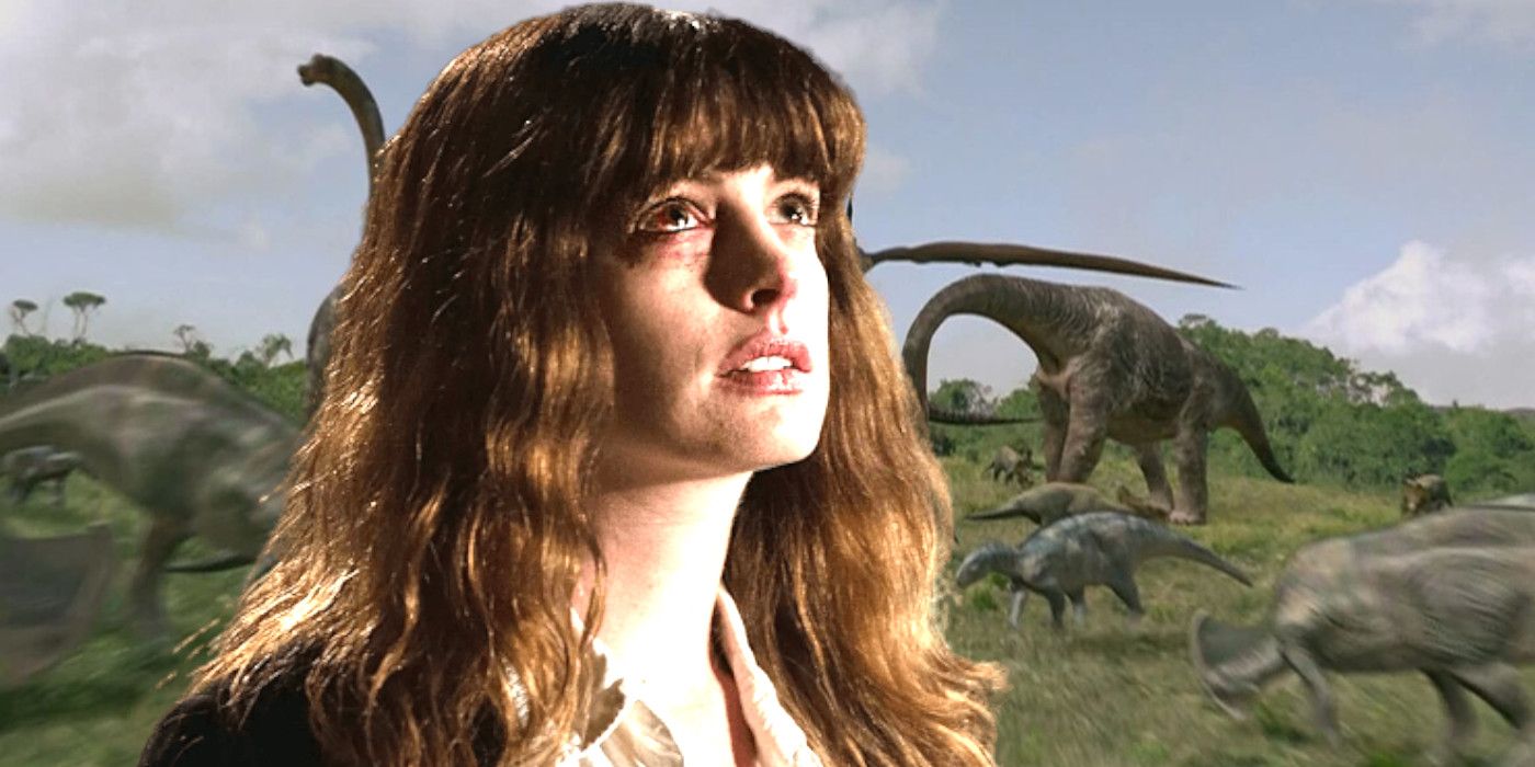 Anne Hathaway with a single bloodshot eye gazing upward against a backdrop of dinosaurs