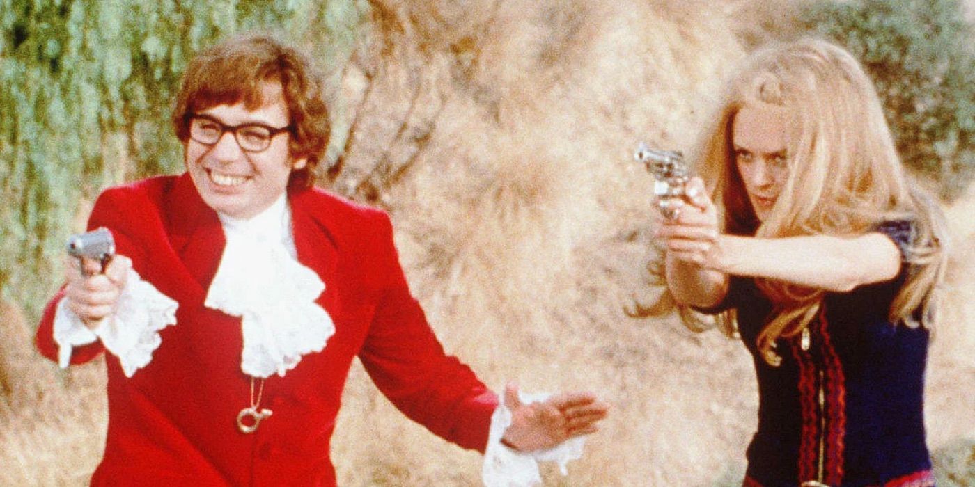 Austin and Felicity point guns in Austin Powers The Spy Who Shagged Me