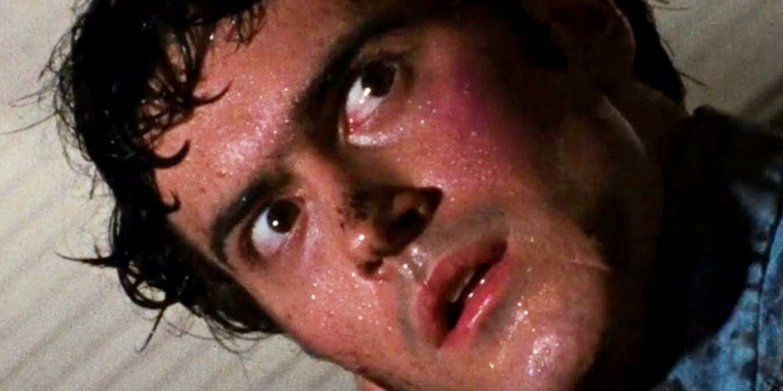 Bruce Campbell as Ash Williams sweating in Evil Dead