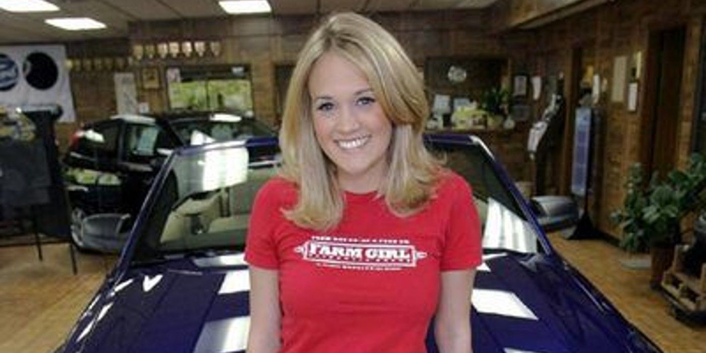 Carrie Underwood from American Idol posing with Ford Mustang