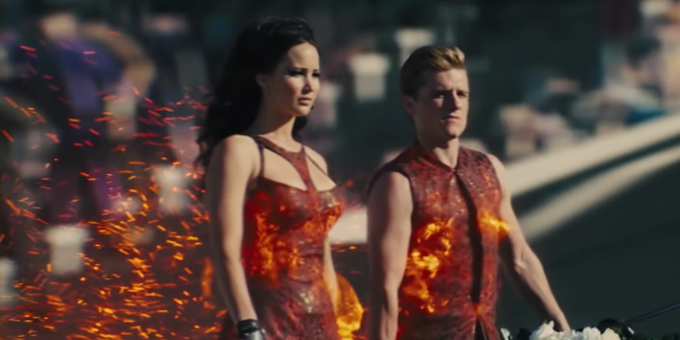 Katniss and Peeta in the tribute parade