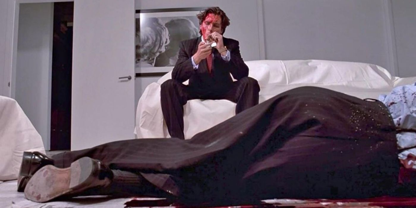 Patrick Bateman (Christian Bale) in American Psycho smoking a cigarette after having just killed Paul Allen.