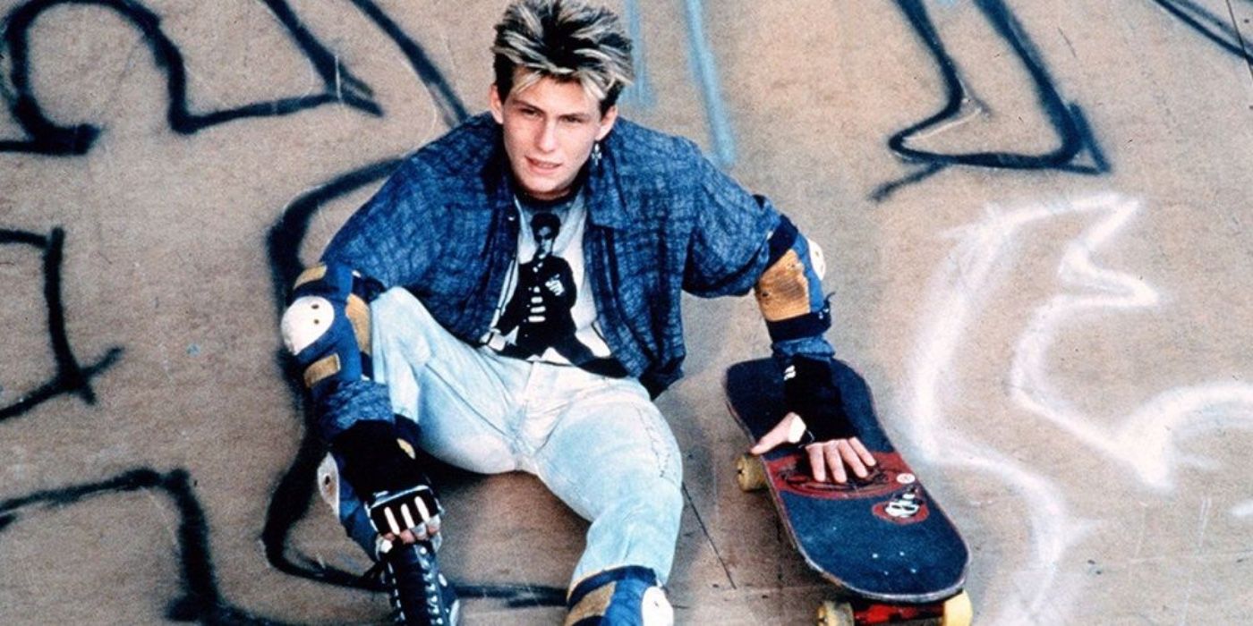 Christian Slater sitting in Gleaming the Cube