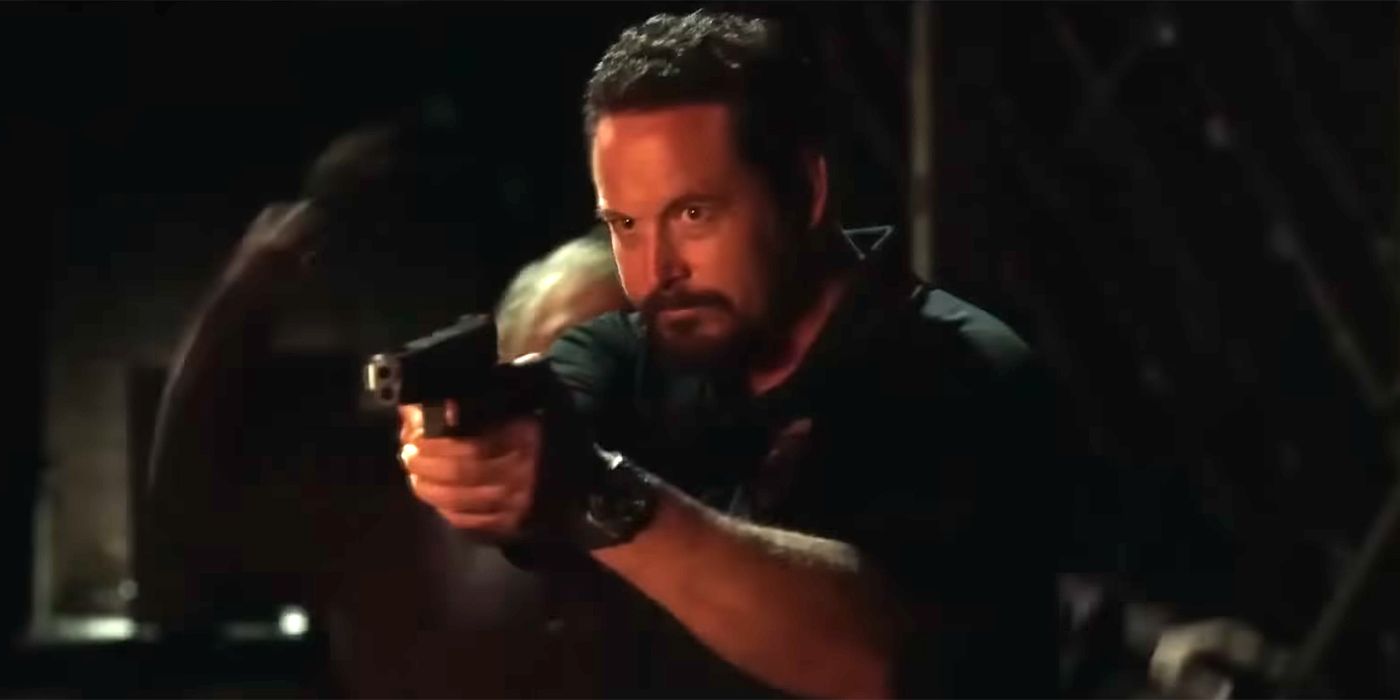 Boyd (Cole Hauser) pointing a gun in The Ritual Killer.