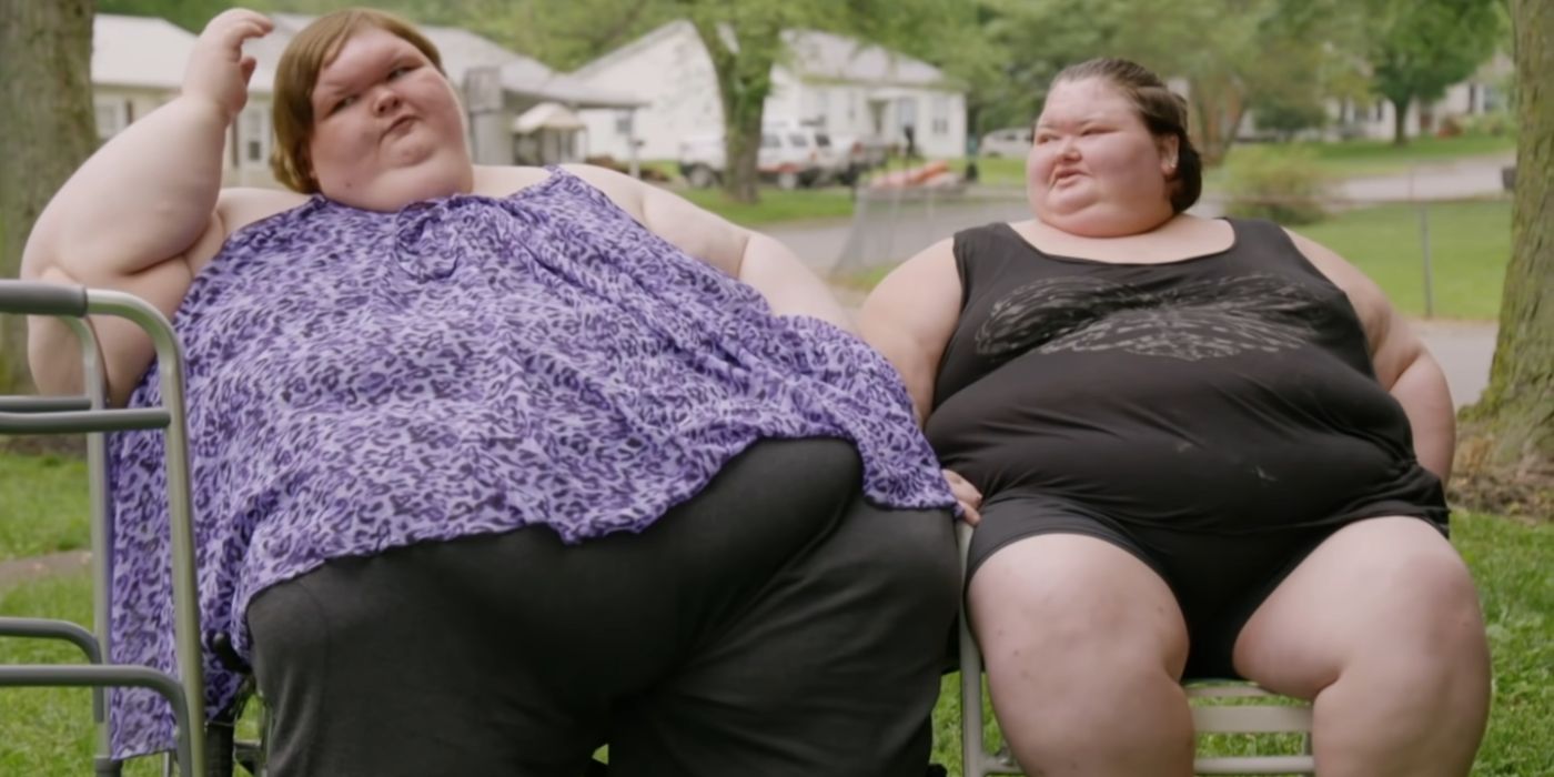 amy in black t-shirt with black shorts and tammy slaton in purple printed flowy top and black trousers talking from 1000-Lb Sisters