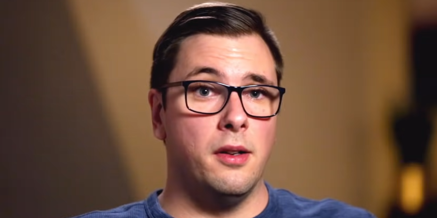 Colt Johnson from 90 Day Fiancé close up brown background