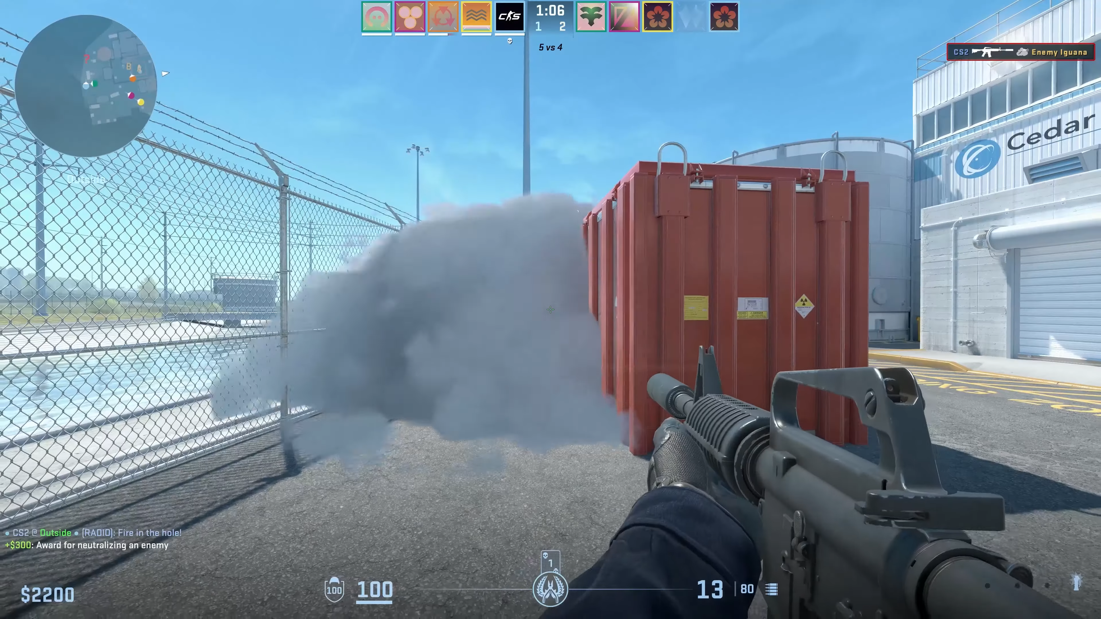 An in-game screenshot from Counter-Strike 2 showing off the game's new volumetric smoke grenade clouds.