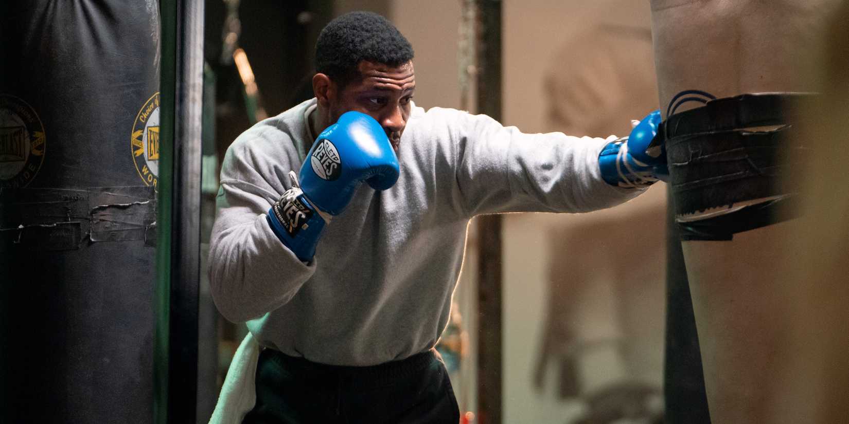 Jonathan Majors as Damian "Diamond Dame" Anderson practicing in Creed III