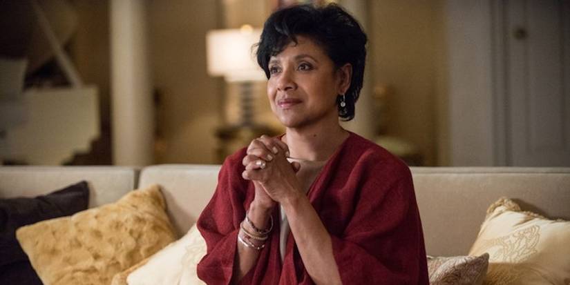 Phylicia Rashaad on a couch as Mary Anne in Creed 3