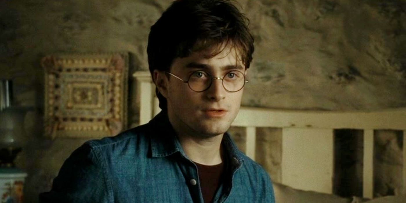 Daniel Radcliffe as Harry Potter looking at Olivander in Harry Potter and the Deathly Hallows Part 2.
