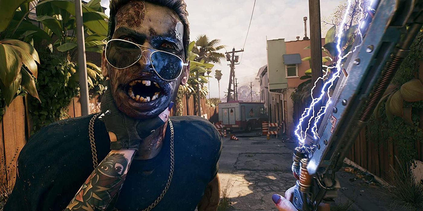 A first person perspective of someone holding a zombie by the throat with one hand, and wielding an electrified sword in the other in Dead Island 2.