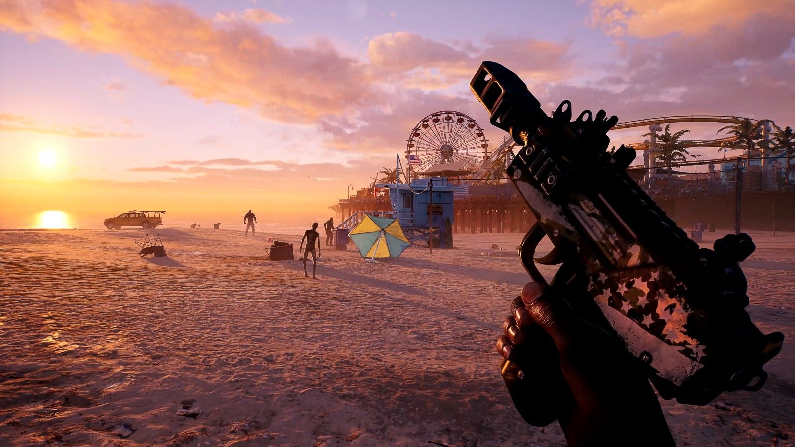 Dead Island 2 beach at sunset with a fairground in the distance, zombies shambling across the sands, and the player holding a machine gun.